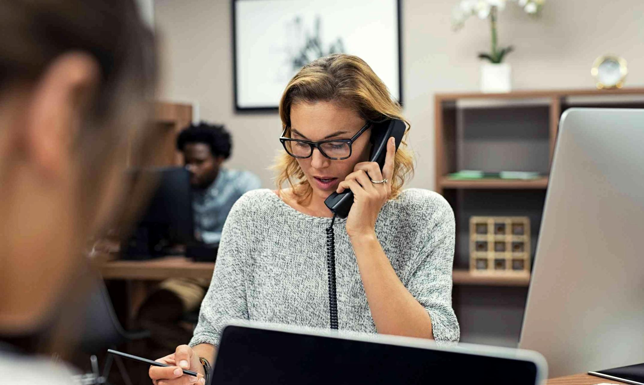 Financial planning session with documents and calculator